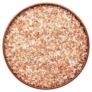 喜马拉雅盐单发圆盘中的粉色和橙粗皮晶体图片