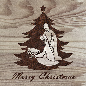 圣诞树上刻有天景象的圣诞树刻在木头上有火光学技术图片