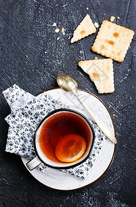 来杯茶加饼干背景图片