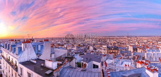 法国巴黎日出时从蒙马特空中向屋顶和埃菲尔塔楼上空看法国巴黎日出时图片