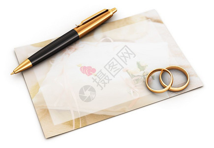 具有创意的抽象婚姻仪式庆祝和爱情概念两个闪亮的黄金结婚戒指球点笔和白背景孤立的空贺卡图片