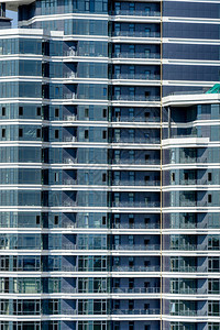 现代摩天大楼办公中心玻璃表面图片