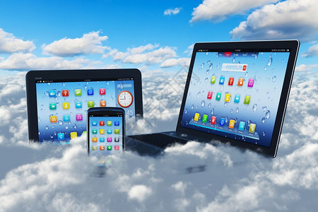 创意云计算概念现代笔记本电脑平板PC和蓝色天空中带云的黑光亮触摸屏智能手机图片