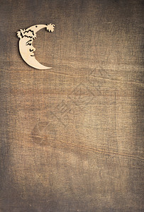 圣诞装饰月亮玩具木背景纹理顶视图图片
