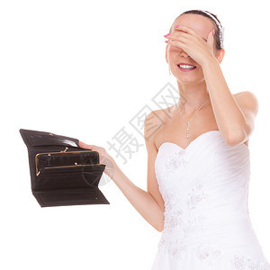 被空钱包抢走的头部所困扰新娘拿着钱包寻找现金的年轻女孩结婚费用支出财政概念穿着白色婚纱的妇女孤立在白色背景中带着空钱包的新娘结婚图片