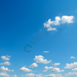 蓝色天空对面的小白云图片