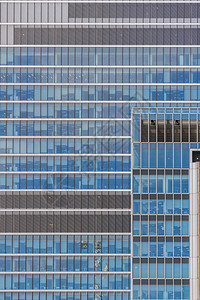 现代和当办公大楼用玻璃和钢作为背景图片