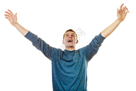 成功的积极情绪快乐的年轻男子成功的小伙手举高向上看孤立在白色背景