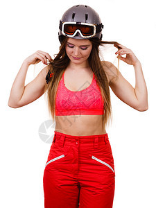 穿着滑雪服和戴护目镜头盔的妇女图片