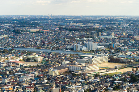 东京公寓在市景背中的空象亚洲智能城市住宅区有河流中午的建筑物图片