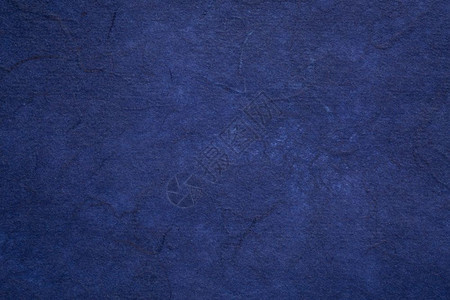 深蓝色纹理手工造毛莓纸背景图片