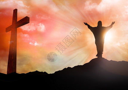 复活基督的圆光教复活节概念日落光线照亮图片