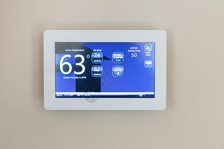 使用数字触摸屏自动调温器的供暖和冷家庭现代技术图片