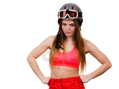 穿着滑雪衣和戴护目镜脸色发怒的头盔妇女图片