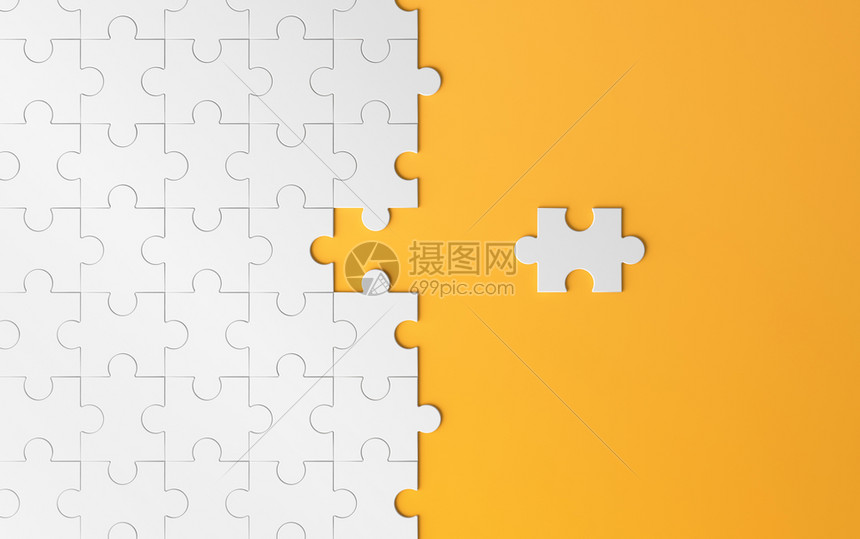 Jigsaw拼图在战略中带有空间的模式纹理以及解决橙色背景团队商业成功伙伴关系概念的策略和解决方案图片