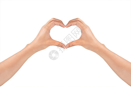 女人和手塑造情人节和日或婚礼的心脏符号在白色背景中孤立图片