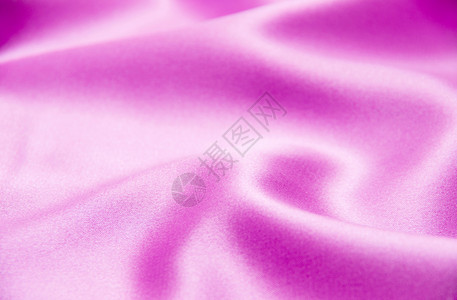 平滑优雅的粉色丝绸可用作背景图片