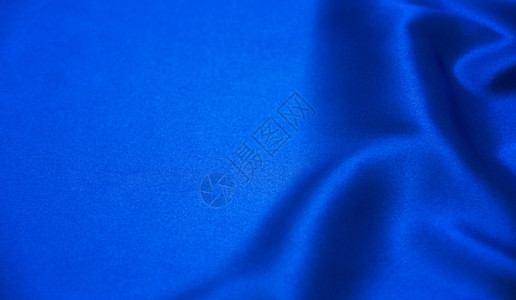 蓝背景奢侈品布料摘要图片