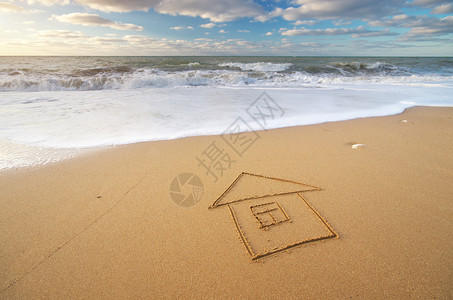 海洋和家园在沙上自然和概念构成图片