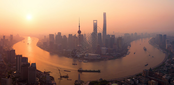 上海市心空景象亚洲智能城市的金融区和商业中心日落时摩天大楼和高的顶层景象图片