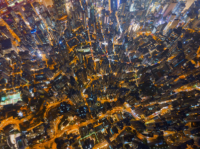 香港市心空景象亚洲智能城市的金融区和商业中心夜间摩天大楼和高层的顶景象图片