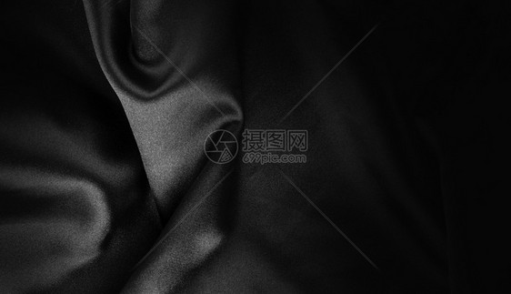黑色纹身暗的卷状花纹丝绸拉皮图片
