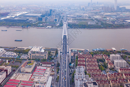 与上海黄浦河的一座桥空中景象位于住宅区的建筑物图片