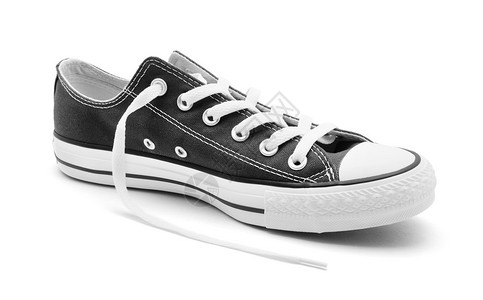 白色背景的黑运动鞋图片