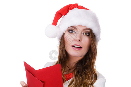穿着圣达克拉斯帽的妇女拿着红色信封阅读背景图片