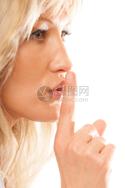 妇女用手指在嘴唇上沉默手势图片