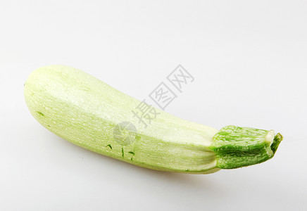 白色背景的新鲜蔬菜Zucchini图片