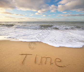 海沙上的时间词概念自然设计图片
