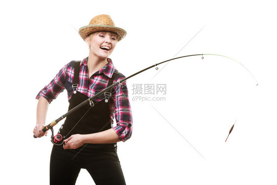 快乐的戴太阳帽子女士拿着钓鱼棒在时玩得开心快乐的戴太阳帽子女士拿着钓鱼棒图片
