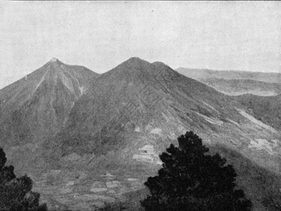 危地马拉的双火山Fuego和Acatenango由190年宇宙与人类撰写的陈年插图背景图片