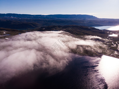 空中观景Hardangervidda山脉高原挪威地貌早晨湖水上空云层旅游者Hardangervidda路线挪威Hardanger图片