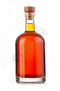 在白背景中孤立的威士忌瓶图片