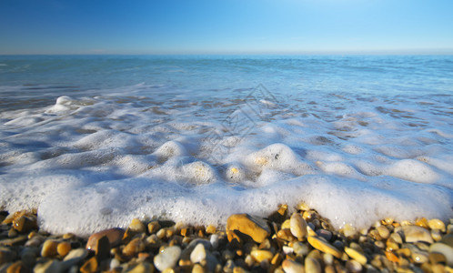 海岸的浪和泡沫自然成分图片