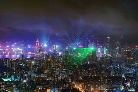 香港市心灯光表演交响乐金融区和亚洲技术智能城市的商业中心夜里天梯和高楼大图片