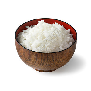 传统的木漆日本碗用白种的熟米饭隔绝在白种背景上背景图片