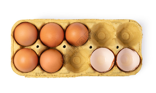 纸箱中十个鸡蛋白底孤立棕色鸡蛋图片