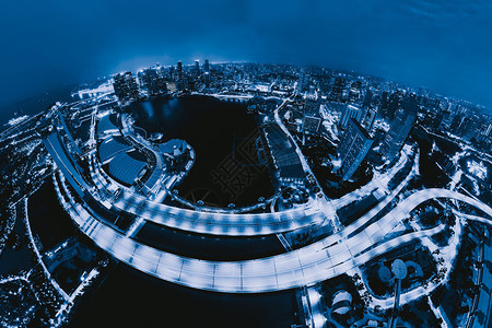新加坡市中心空景象亚洲技术智能城市金融区和商业中心夜幕天梯和高楼大图片