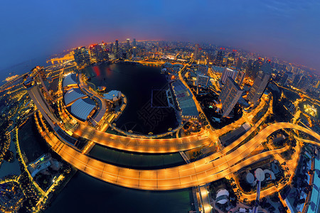 新加坡市中心空景象亚洲技术智能城市金融区和商业中心夜幕天梯和高楼大图片