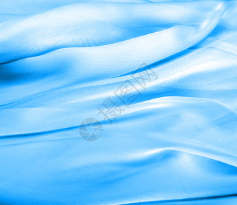 抽象蓝丝织布背景图片