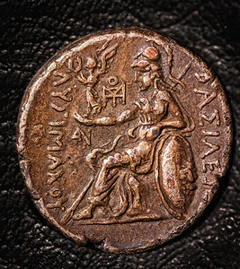 深黑背景的古希腊硬币四色旧希腊图片