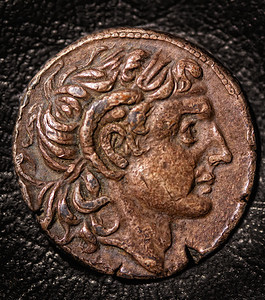 深黑背景的古希腊硬币四色旧希腊图片