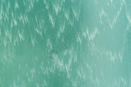 接近地表蓝色或绿的瀑布游泳池纹理水的背景图片