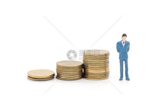 玩具商人和白背景的硬币图片