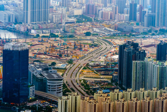 香港市中心国共和金融区亚洲智能城市的商业中心日落时的天梯和高楼现代建筑图片