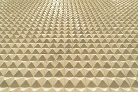 三角形金字塔瓷砖图案表面纹理用于设计装饰背景的建筑内部材料关闭图片