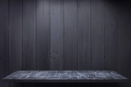 黑色背景的木制架壁质表面图片